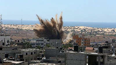 Flames and smoke billow after an Israeli airstrike in Rafah, in the southern Gaza Strip, on May 19, 2021. Photo by Abed Rahim Khatib/Flash90.