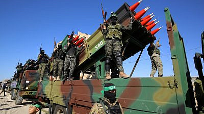 Hamas terrorists attend a parade in Khan Yunis, in the southern Gaza Strip, on May 27, 2021. Photo by Abed Rahim Khatib/Flash90.