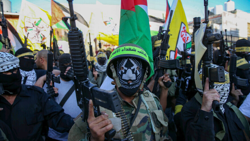 Members of Fatah's Al-Aqsa Martyrs Brigades terrorist organization rally in support of Palestinian Authority head Mahmoud Abbas near Hebron, June 27, 2021. Photo by Wissam Hashlamoun/Flash90.
