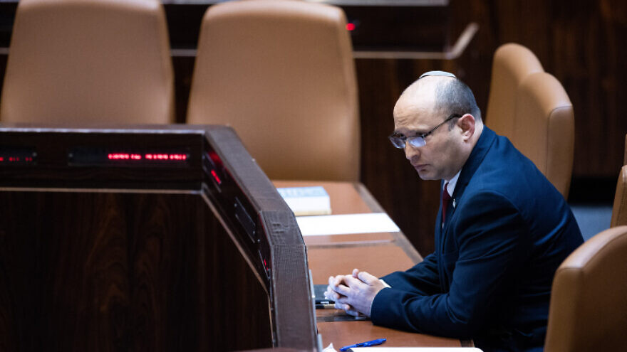 Israeli Prime Minister Naftali Bennett at the Knesset assembly hall for a special session in memory of Ze'ev Jabotinsky, on July 13, 2021. Photo by Yonatan Sindel/Flash90.