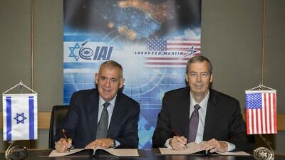Boaz Levy (left), president and CEO of Israel Aerospace Industries (IAI) with Tim Cahill, senior vice president of global business development at Lockheed Martin. Credit: IAI.