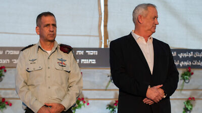IDF Chief of Staff Lt. Gen. Aviv Kochavi and Israeli Minister of Defense Benny Gantz at a ceremony for a new monument in memory of fallen soldiers of the South Lebanon Army (SLA), in Metula, in northern Israel, on July 4, 2021. Photo by Basel Awidat/Flash90.