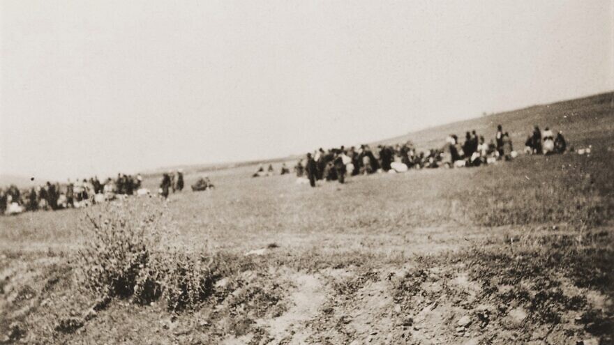 Jews at the killing site outside of Kamenets-Podolsk, a city in western Ukraine, late August 1941. Credit: United States Holocaust Memorial Museum Photo Archives/Courtesy of Ivan Sved.
