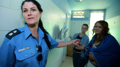 A guard speaks to inmates at Neve Tirtza, Israel's only women's prison, in Ramle. July 21, 2010. Photo by Moshe Shai/Flash90.