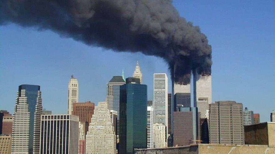 A view of the Twin Towers of the World Trade Center in New York City on fire after hijacked planes flew into the buildings on the morning of Sept. 11, 2001. Credit: Wikimedia Commons.