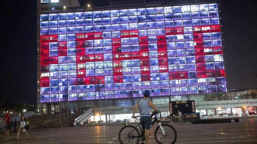 Tel Aviv City Hall lights up with the word “Peace” following the signing of the Abraham Accords, Sept. 15, 2020. Photo by Miriam Alster/Flash90.