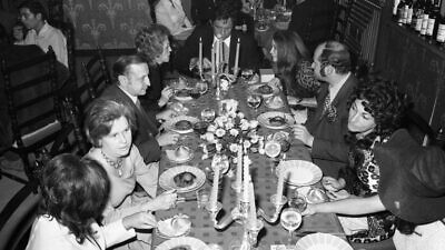 American singer and songwriter Johnny Cash at a lavish meal in Jerusalem held in his honor on his third visit to Israel, November 1971. Credit: The Dan Hadani Archive, Pritzker Family National Photography Collection at the National Library of Israel, Jerusalem/IPPA staff.