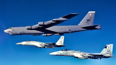 Israeli Air Force F-15s escort an American B-52 bomber through Israeli skies on Feb. 14, 2022. Credit: IDF Spokesperson's Unit.