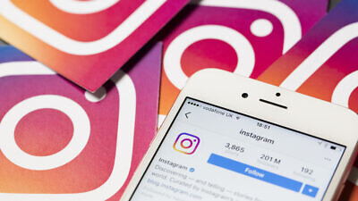 An apple iPhone showing the Instagram application. Credit: Ink Drop/Shutterstock.
