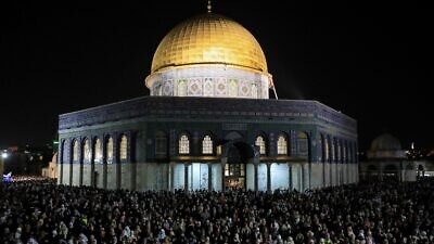 Tens of thousands of Muslim worshippers pray at the Al-Aqsa mosque compound on Qadr Night (Laylat al-Qadr) during the month of Ramadan in Jerusalem's Old City, April 27, 2022. Photo by Jamal Awad/Flash90.