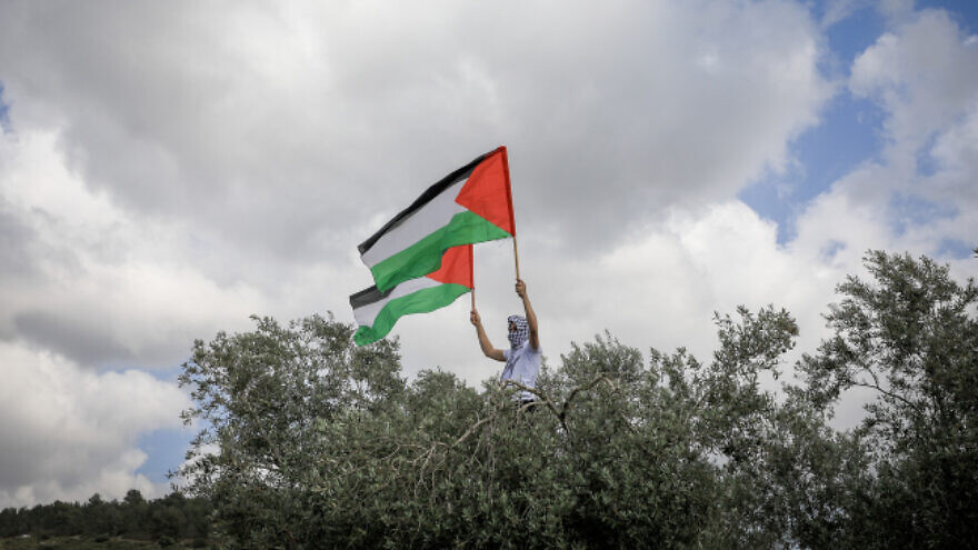 Israeli Arabs and left-wing activists take part in a rally marking the 74th anniversary of "nakba," the term used to mark the events leading to Israel's founding in 1948, near Sakhnin in northern Israel on April 5, 2022. Photo by Jamal Awad/Flash90.
