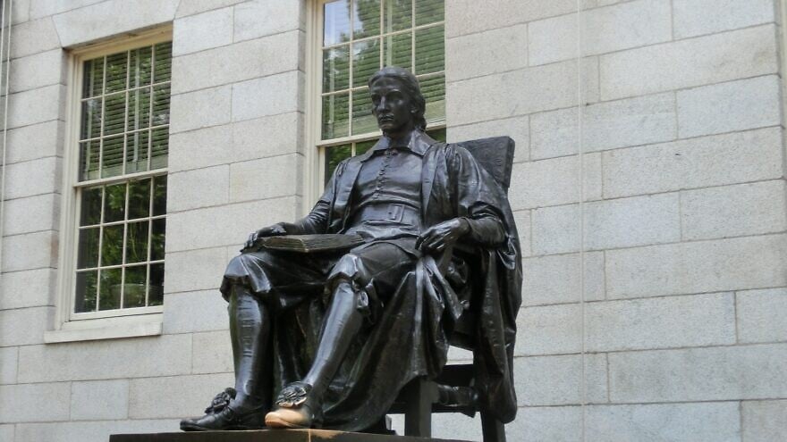 A statue of John Harvard at Harvard University in Cambridge, Mass. Credit: Pixabay.
