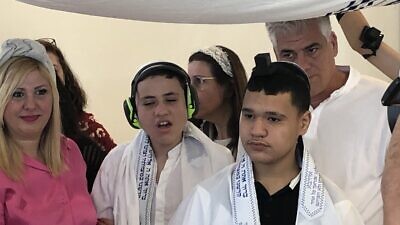 Yair and Aviv, two 13-year-olds with autism, celebrate their bar mitzvah in Rehovot, Israel, on May 26, 2022. Photo by Howard Blas.