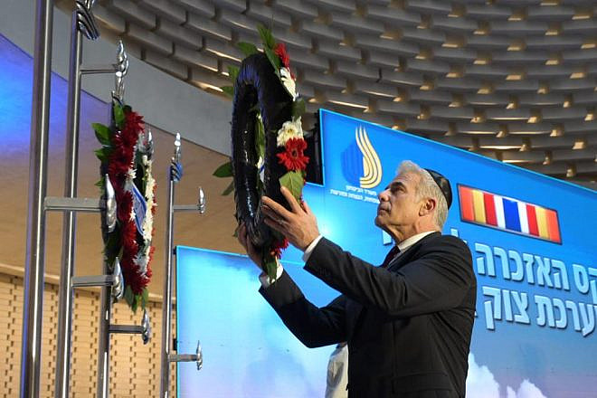 Israeli Prime Minister Yair Lapid attends a state ceremony commemorating those killed during the 2014 war against Hamas, on July 10, 2022 in Jerusalem. Credit: Amos Ben-Gershom/GPO