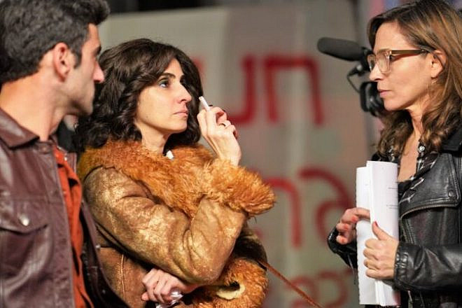 Israeli director Zohar Wagner, far right, on set of “Savoy” with actors Dana Ivgy and Amir Bitton. Photo by Michael Olmert courtesy of Jerusalem Film Festival.