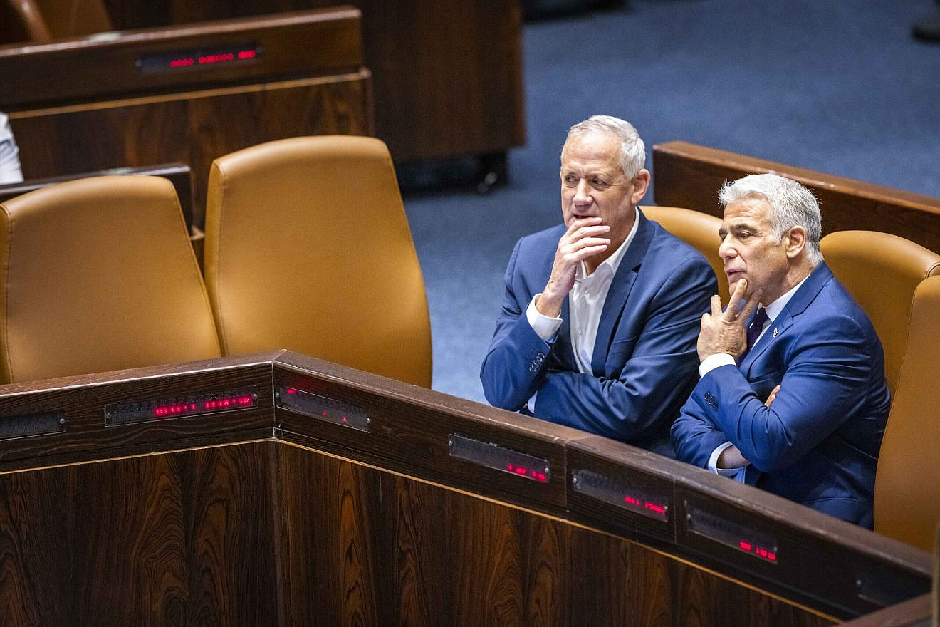 Then-Defense Minister Benny Gantz (left) and then-Prime Minister Yair Lapid in the Knesset. Photo by Olivier Fitoussi/Flash90.