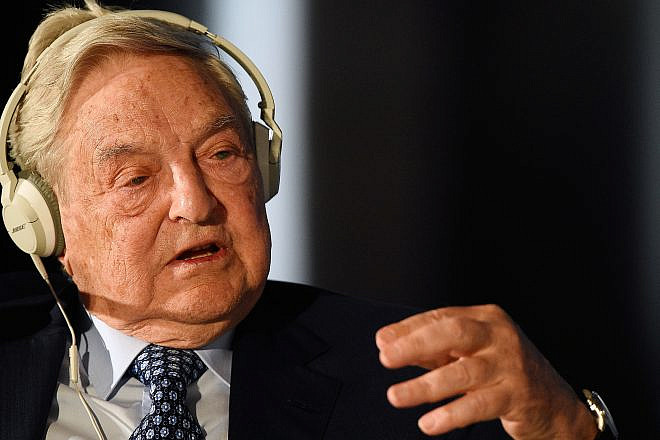 George Soros, the Hungarian-born American billionaire, investor and philanthropist, speaks during a political and financial meeting in Italy in 2014. Credit: Giacomo Morinini/Shutterstock.