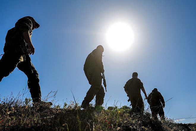 Israeli Defense Forces soldiers from the 53rd Battalion of the 188th Tank Brigade are on alert in a military outpost overlooking Syrian villages near the Israeli border, southern Golan Heights on May 23, 2022. Photo by Michael Giladi/Flash90.