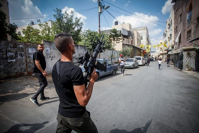 Palestinian gunmen attend the funeral in Jenin of Muhammad Saban, who was killed during clashes with Israeli forces, Sept. 6, 2022. Photo by Nasser Ishtayeh/Flash90.