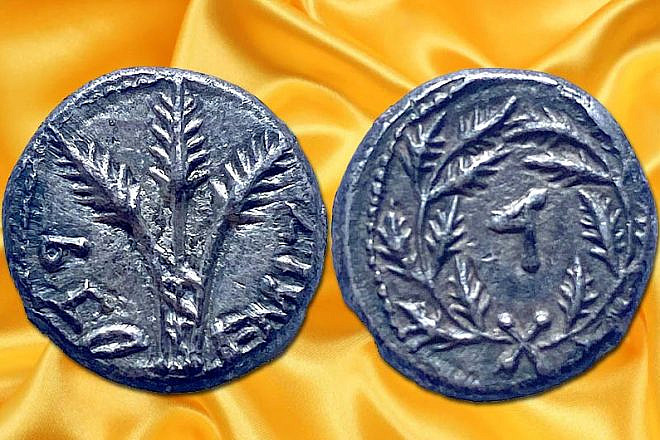The two faces of the Year Four Quarter Shekel, minted in 69 C.E. during the Great Jewish Revolt against the Roman Empire. Credit: Israel Antiquities Authority.