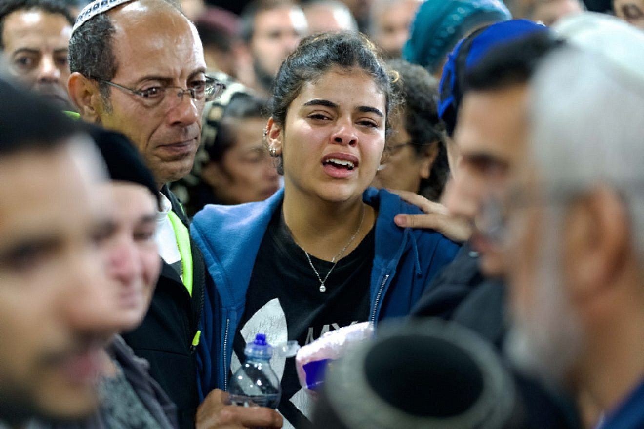 Mourners attend the funeral of 50-year-old Tamir Avihai at Ariel Cemetery in Samaria, Nov. 15, 2022. Avihai was killed when a terrorist rammed his car into him near Ariel earlier in the day. Photo by Erik Marmor/Flash90.