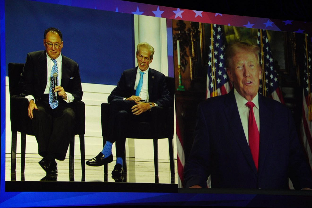Republican Jewish Coalition CEO Matt Brooks (left) and National chairman Sen. Norm Coleman speak with former President Donald Trump, who appeared via satellite at the RJC's annual meeting, Nov. 19, 2022. Credit: Republican Jewish Coalition.