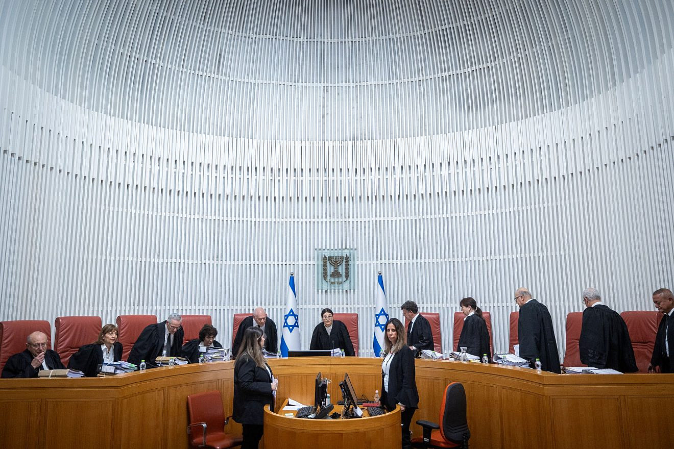 Israeli Supreme Court justices arrive for a hearing in Jerusalem on the appointment of Shas leader Aryeh Deri as a government minister, Jan. 5, 2023. Photo by Yonatan Sindel/Flash90.