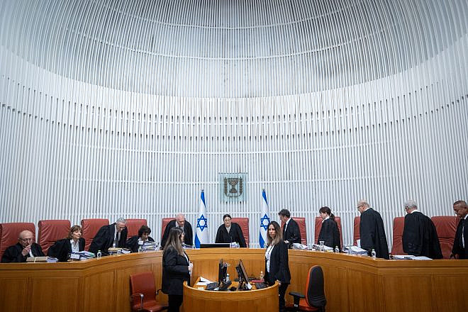 Israeli Supreme Court justices arrive for a hearing in Jerusalem on the appointment of Shas leader Aryeh Deri as a government minister, Jan. 5, 2023. Photo by Yonatan Sindel/Flash90.