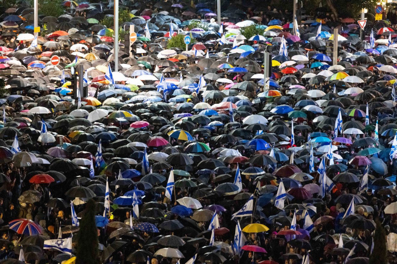 Thousands of Israelis protest against the proposed changes to the legal system at Habima square in Tel Aviv, Jan. 14, 2023. Photo by Yonatan Sindel/Flash90.