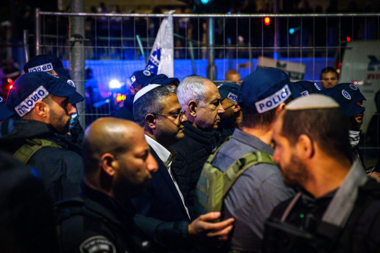 Israeli Prime Minister Benjamin Netanyahu and Israeli National Security Minister Itamar Ben-Gvir at the scene of a deadly Palestinian terrorist attack in Jerusalem, Jan. 27, 2023. Credit: Olivier Fitoussi/Flash90.