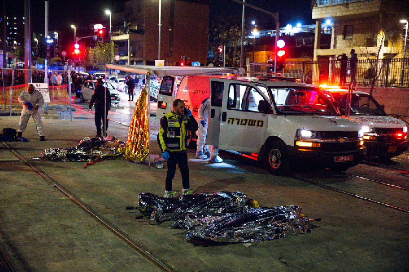 Israeli security and rescue forces at the scene of a deadly shooting attack in the Neve Ya'akov neighborhood of Jerusalem, Jan. 27, 2023. Photo by Olivier Fitoussi/Flash90.