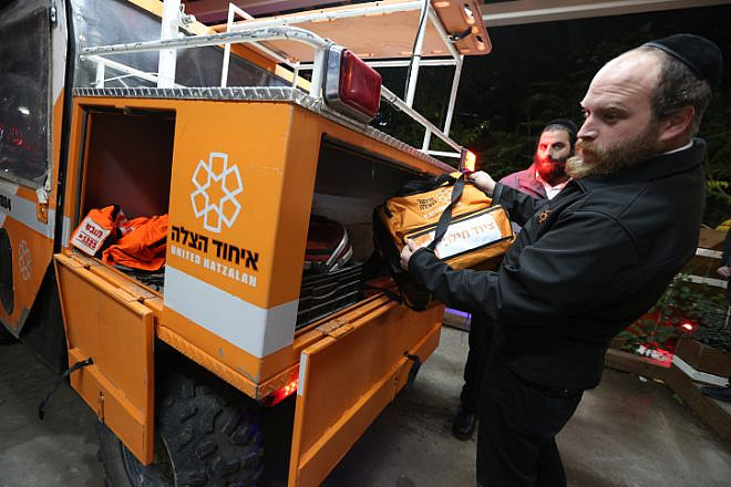 United Hatzalah volunteers check their gear in the city of Tzfat, Dec. 19, 2021. Photo by David Cohen/Flash90.