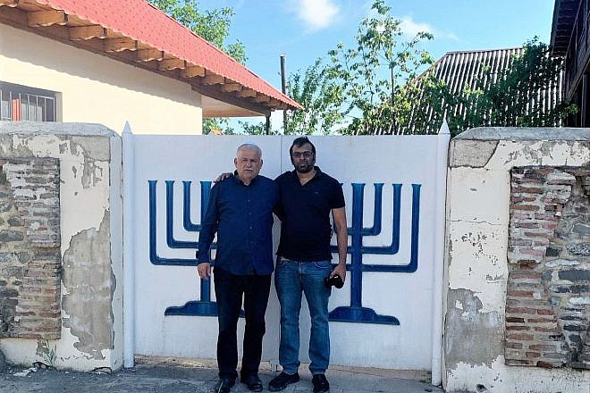 Timur Natalemov (left), 66, caretaker of synagogues in Oghuz, Azerbaijan, with the author, Avi Kumar. Credit: Courtesy.