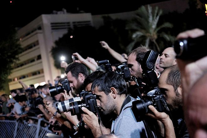 A group of photo journalists in Tel Aviv on Nov. 14, 2015. Credit: Tomer Neuberg/Flash90.