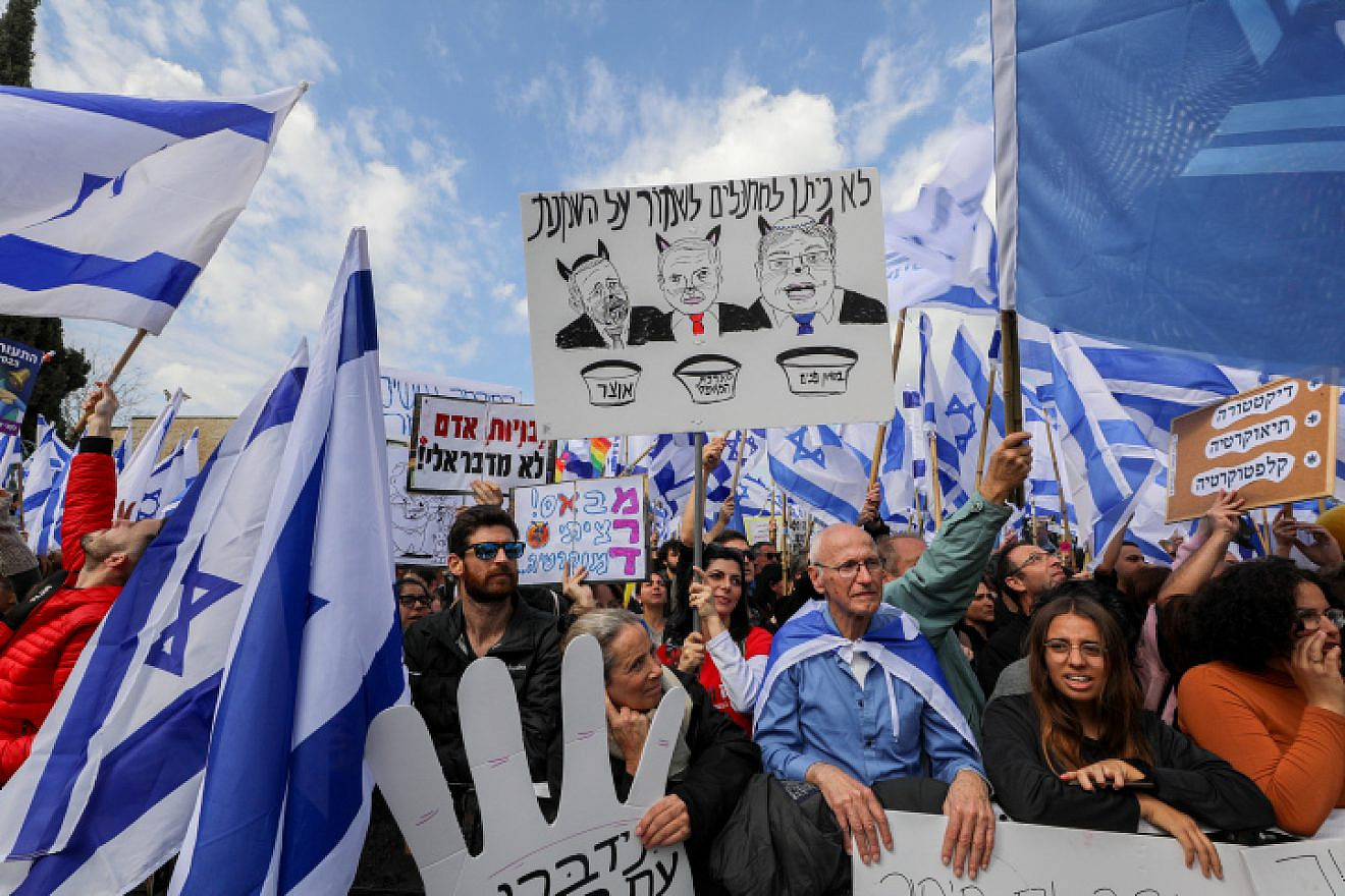 Israelis protest against the government's judicial reform package outside the Knesset in Jerusalem, Feb. 13, 2023. Credit: Jamal Awad/Flash90.
