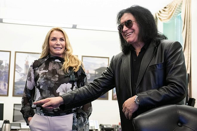 Gene Simmons, bassist and co-lead singer of the rock band KISS; and his wife Shannon Tweed-Simmons, visit the Pentagon meeting with members of the Joint Staff including Air Force Gen. Paul J. Selva, vice chairman of the Joint Chiefs of Staff, and Army Command Sgt. Maj. John W. Troxell, Senior Enlisted Advisor to the chairman of the Joint Chiefs of Staff, May 16, 2019. Credit: DoD Photo by U.S. Army Sgt. James K. McCann/Flickr via Wikimedia Commons.