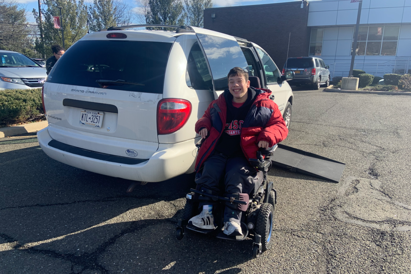 Yachad/JUF NJ participant Jacob Adler after exiting donated van following Yachad trip