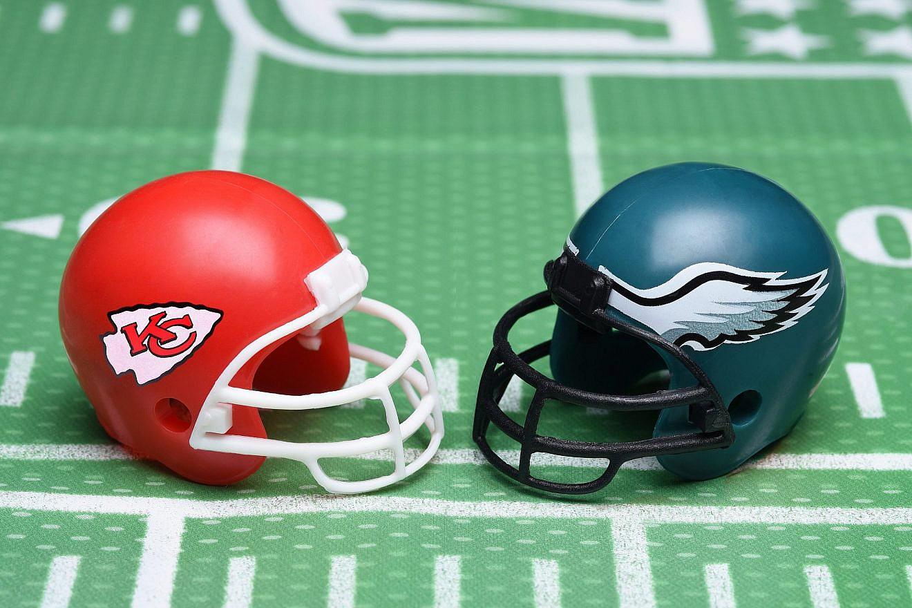 Football helmets of the Kansas City Chiefs and Philadelphia Eagles, opponents in Super Bowl LVII on Feb. 12, 2023. Credit: Shutterstock.