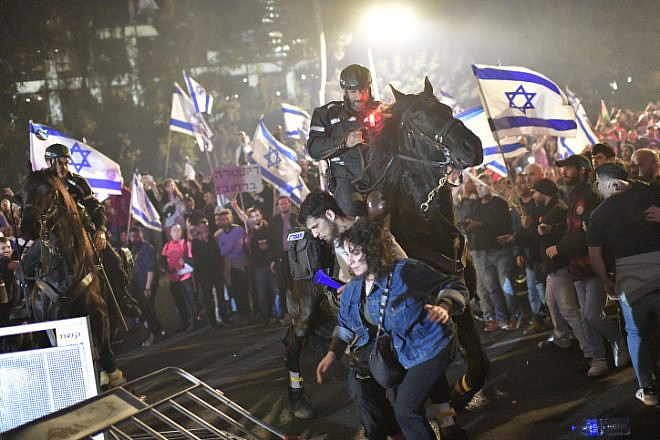 Israelis block the Ayalon Highway in Tel Aviv during a protest against the Israeli government's planned judicial overhaul on March 26, 2023. Photo by Tomer Neuberg/Flash90.
