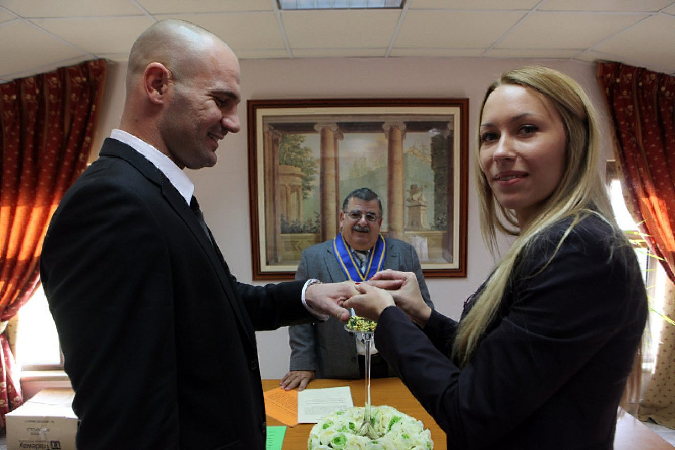 Israelis Dudu and Yuliya Zvili wed in a civil ceremony performed by the mayor of Aradippou, Cyprus, on Dec. 16, 2010. Photo by Yossi Zamir/Flash90.