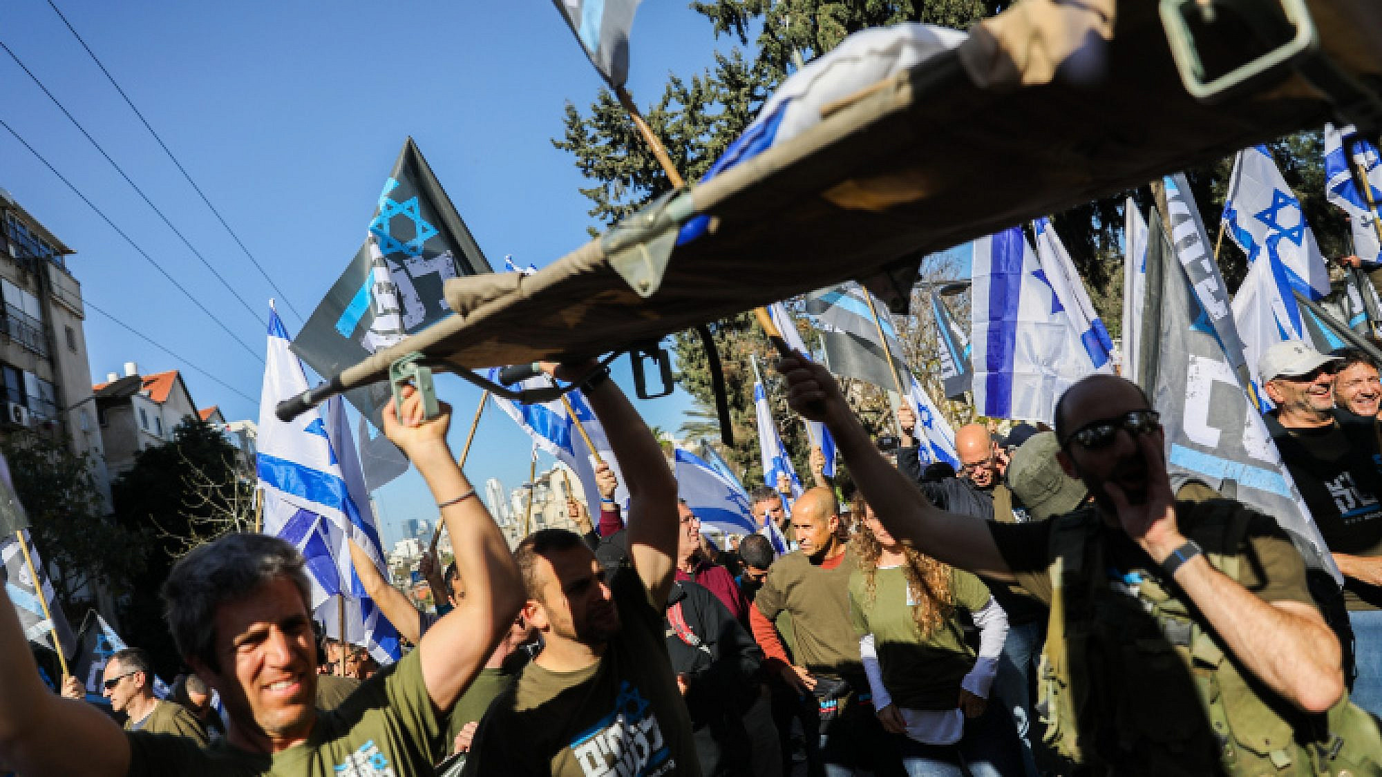 Israeli reservists and activists protest against the Israeli government's planned judicial reform, in the city of Bnei Brak, March 16, 2023. Photo by Flash90.