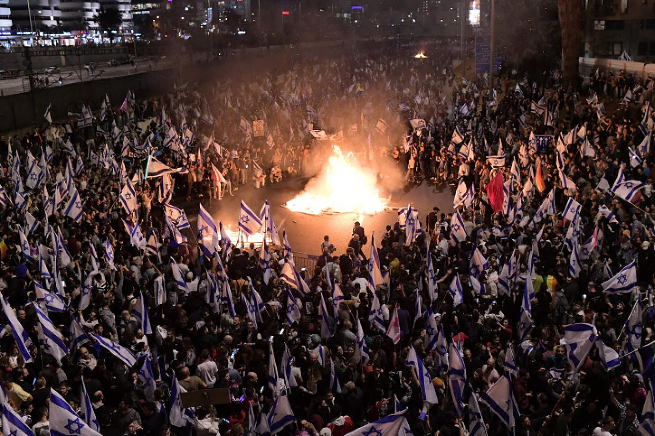 Israelis block the Ayalon Highway in Tel Aviv during a protest against the Israeli government's planned judicial overhaul on March 26, 2023. Photo by Tomer Neuberg/Flash90.