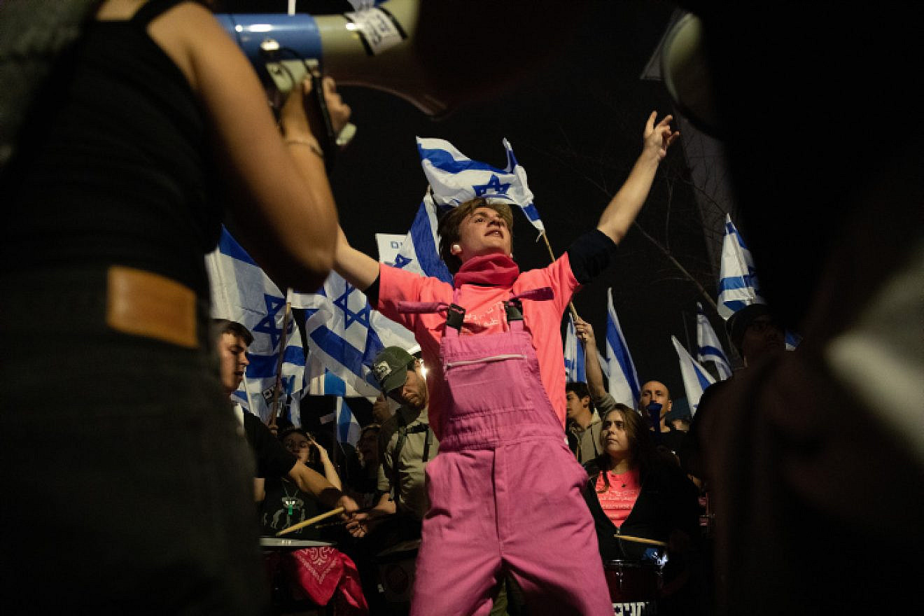Israelis protest in Haifa against the Israeli government's planned judicial on March 26, 2023. Photo by Shir Torem/Flash90.