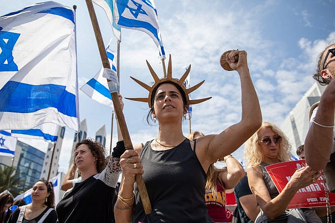 Israelis protest against the Israeli government's planned judicial overhaul, in Haifa, March 27, 2023. Photo by Shir Torem/Flash90.