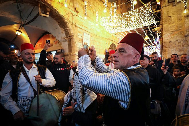 Palestinian Arabs celebrate the first night of the holy month of Ramadan in Jerusalem's Old City on March 23, 2023. Photo by Jamal Awad/Flash90.