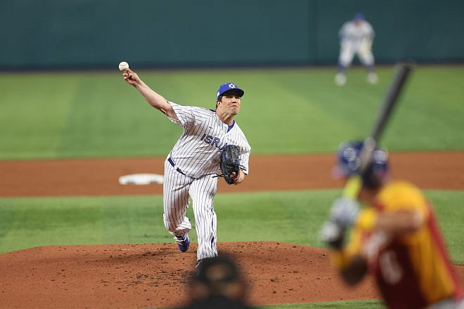 Robert Stock pitches for Team Israel in its 5-1 loss against Venezuela in the World Baseball Classic in Miami, March 15. Credit: MLB Photos.