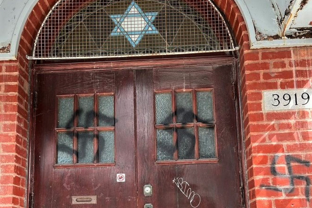 Swastikas on the front doors and adjacent brick facade of the Bagg Street Shul in Montreal, Canada, March 2023. Source: Twitter/Michal Cotler-Wunsch.