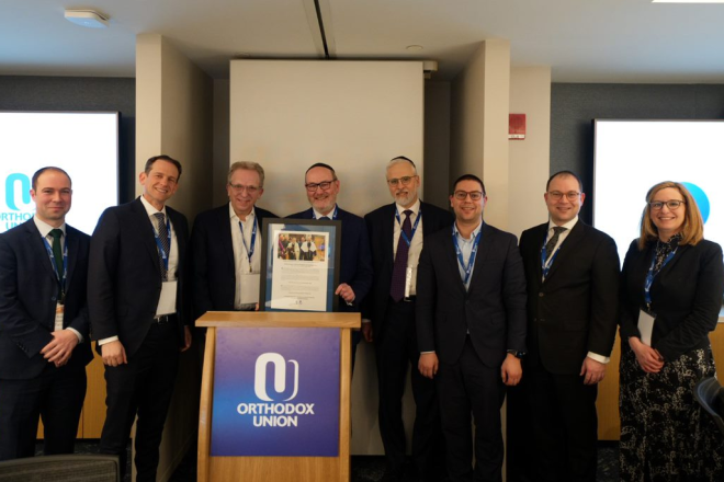 From left: National director of the OU's Community Projects and Partnerships Rabbi Simon Taylor; OU executive vice president and COO Rabbi Dr. Josh Joseph; United Synagogue president Michael Goldstein; OU president Mitchel Aeder; OU executive vice president Rabbi Moshe Hauer; United Synagogue COO David Collins; United Synagogue Trustee Saul Taylor; and United Synagogue CEO Jo Grose. Credit: Courtesy.