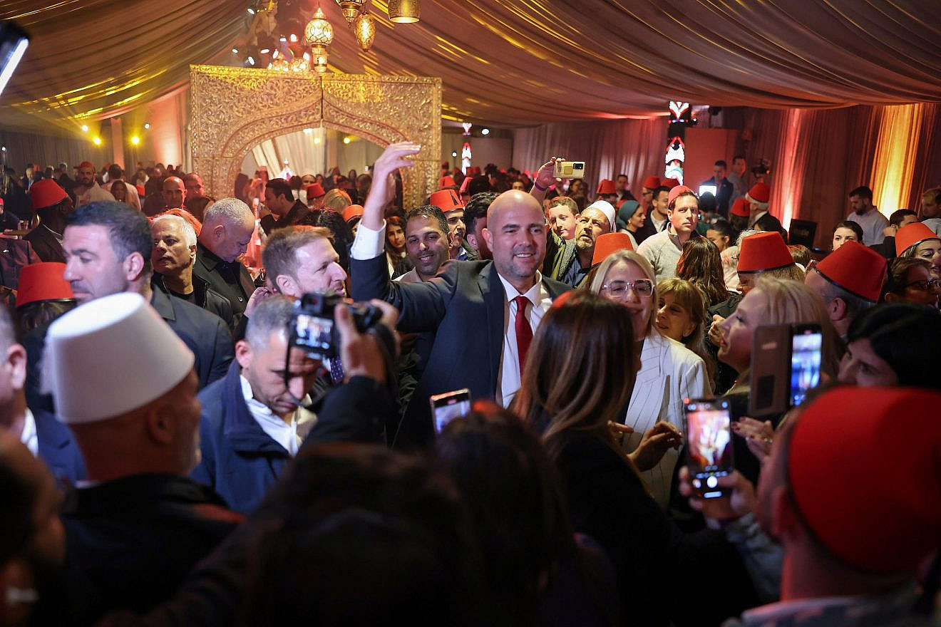 Knesset Speaker Amir Ohana (center) celebrates Mimouna at the Knesset Plaza in Jerusalem, April 12, 2023. Credit: Knesset.