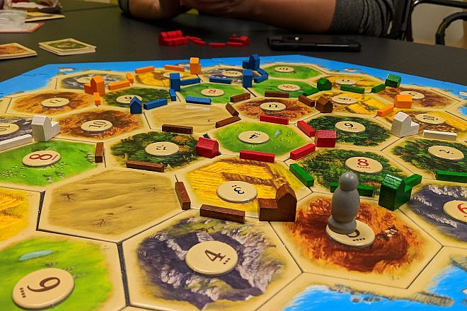 A game of “Settlers of Catan.” Credit: Yongho Kim via Wikipedia.